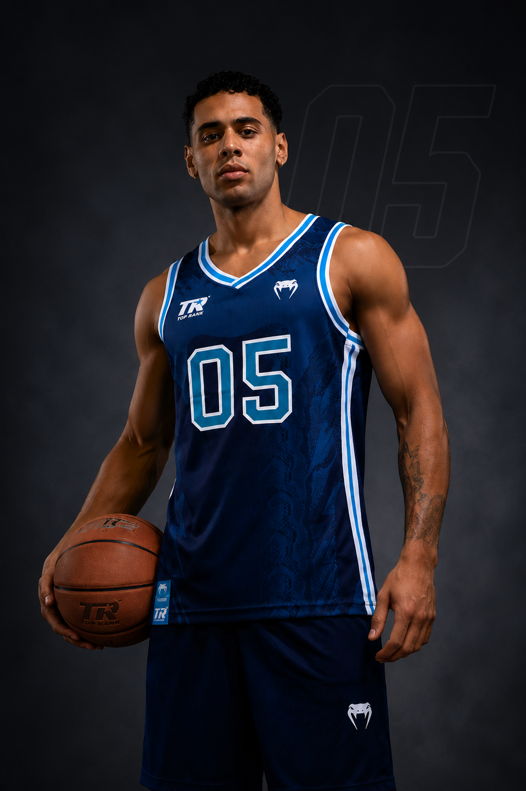 Basketball player in a blue jersey holding a basketball against a dark background
